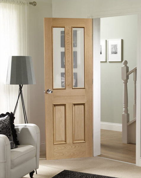 Malton With Raised Mouldings Internal Oak Door with Clear Bevelled Glass